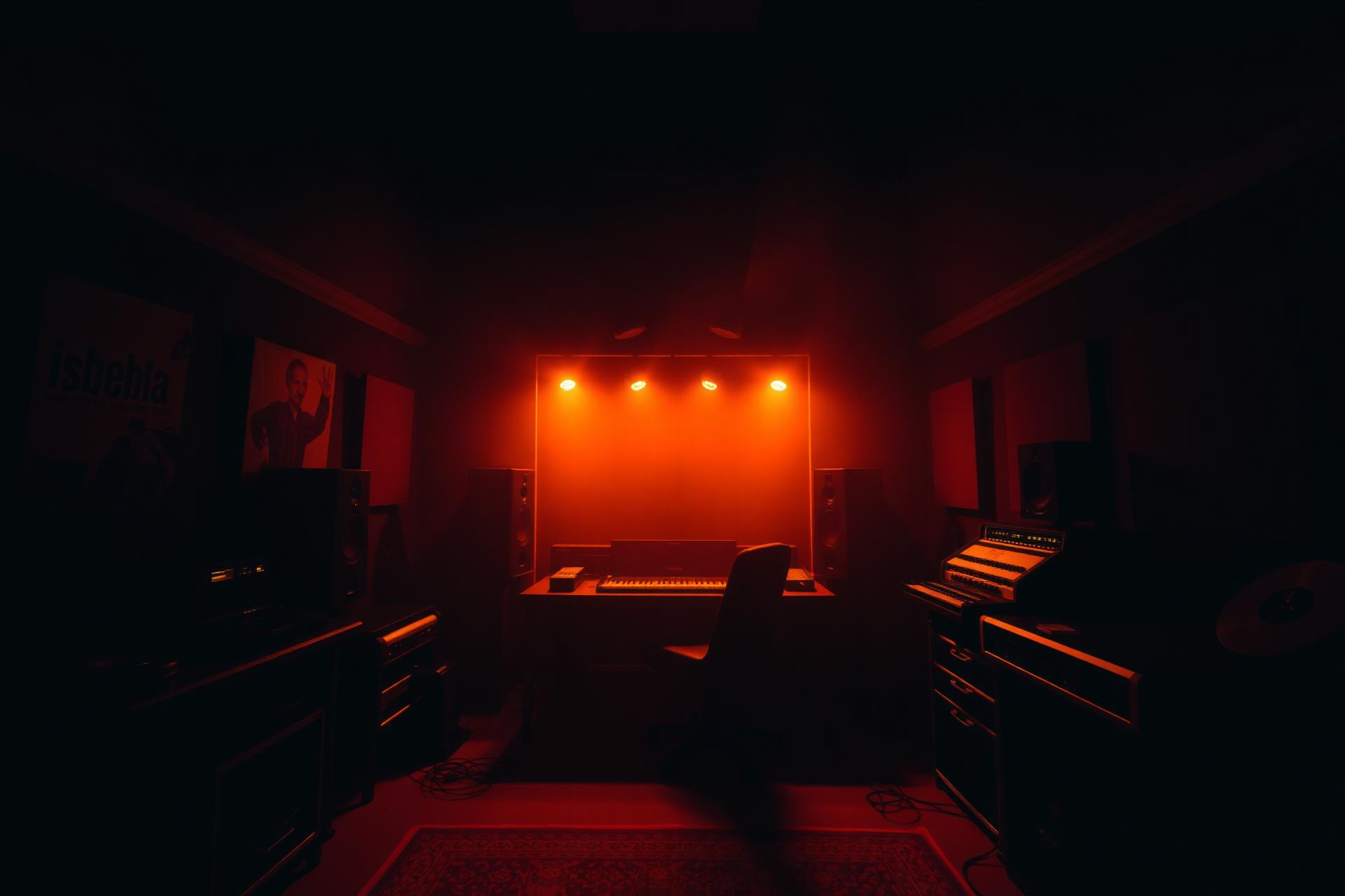 Warmly lit recording studio at night